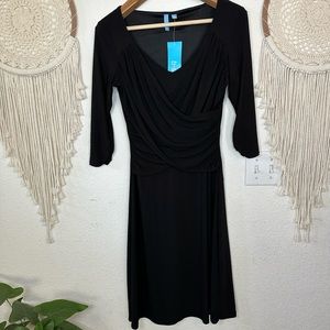 B slim black figure flattering knee length dress small NEW